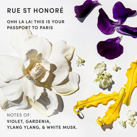 OUAI hair oil next to keys to demonstrate small travel-friendly size