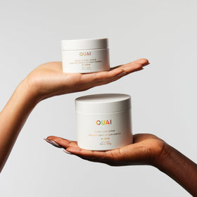 OUAI product label close-up showing ingredients and recyclable guidance