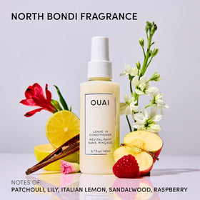 OUAI bottle in hand illustrating compact travel-friendly scale