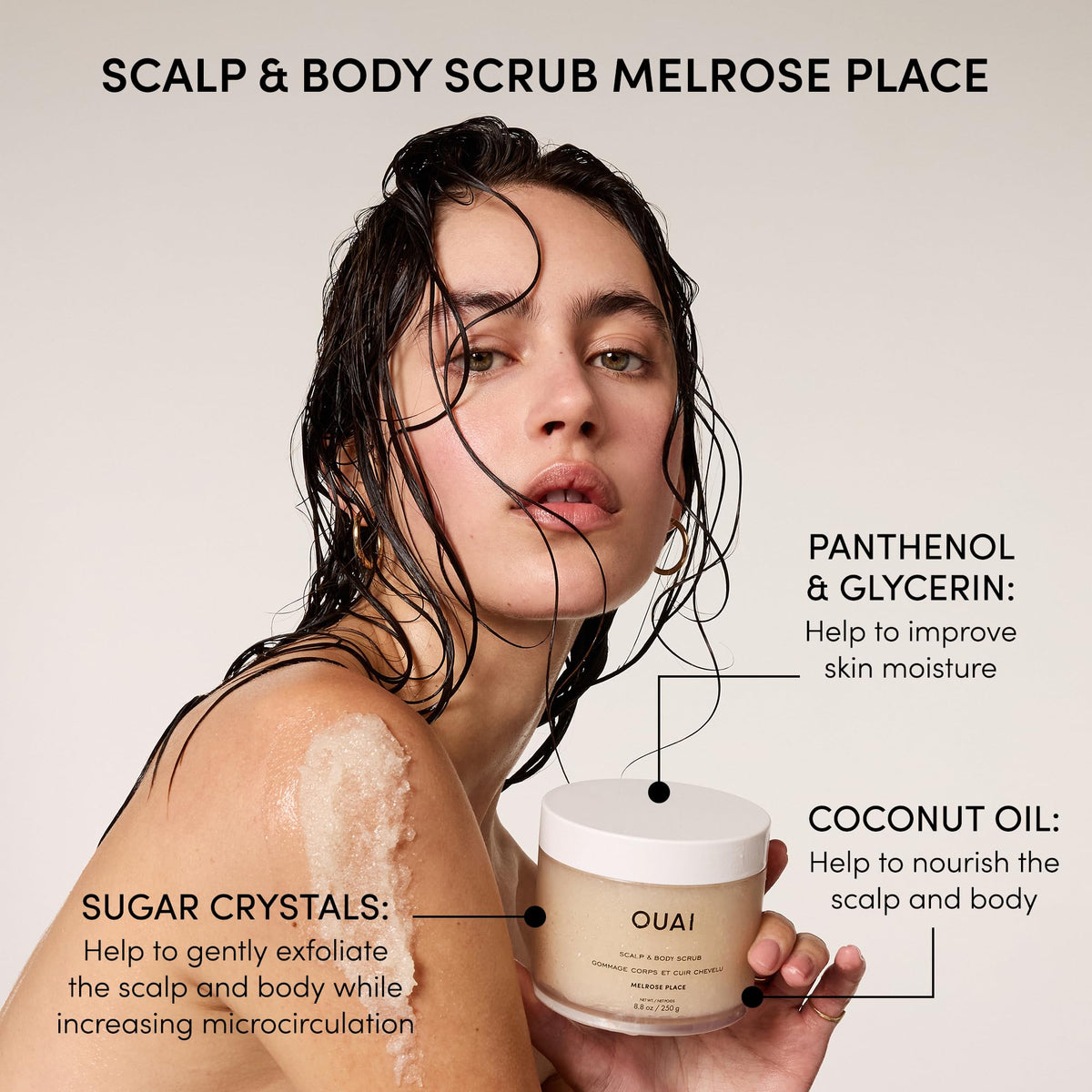 OUAI lifestyle image of applying scrub in shower demonstrating targeted scalp refresh and smoothing