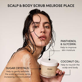 OUAI lifestyle image of applying scrub in shower demonstrating targeted scalp refresh and smoothing