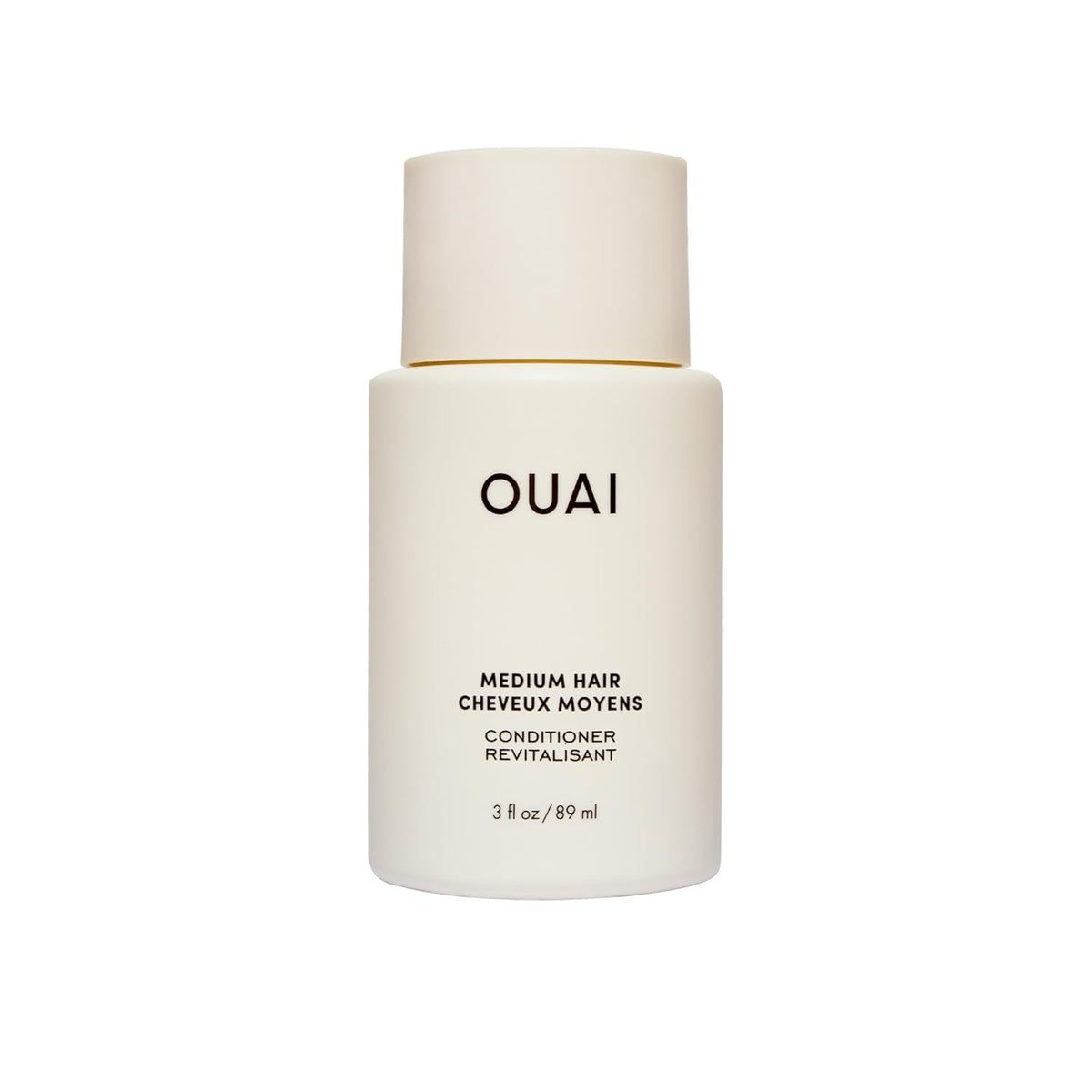 OUAI medium conditioner front tube showing compact travel-friendly design and benefits