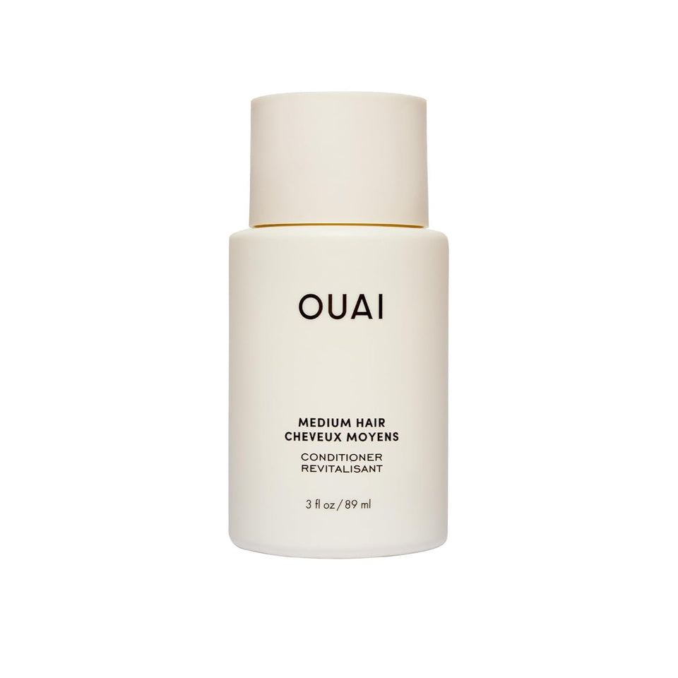 OUAI medium conditioner front tube showing compact travel-friendly design and benefits