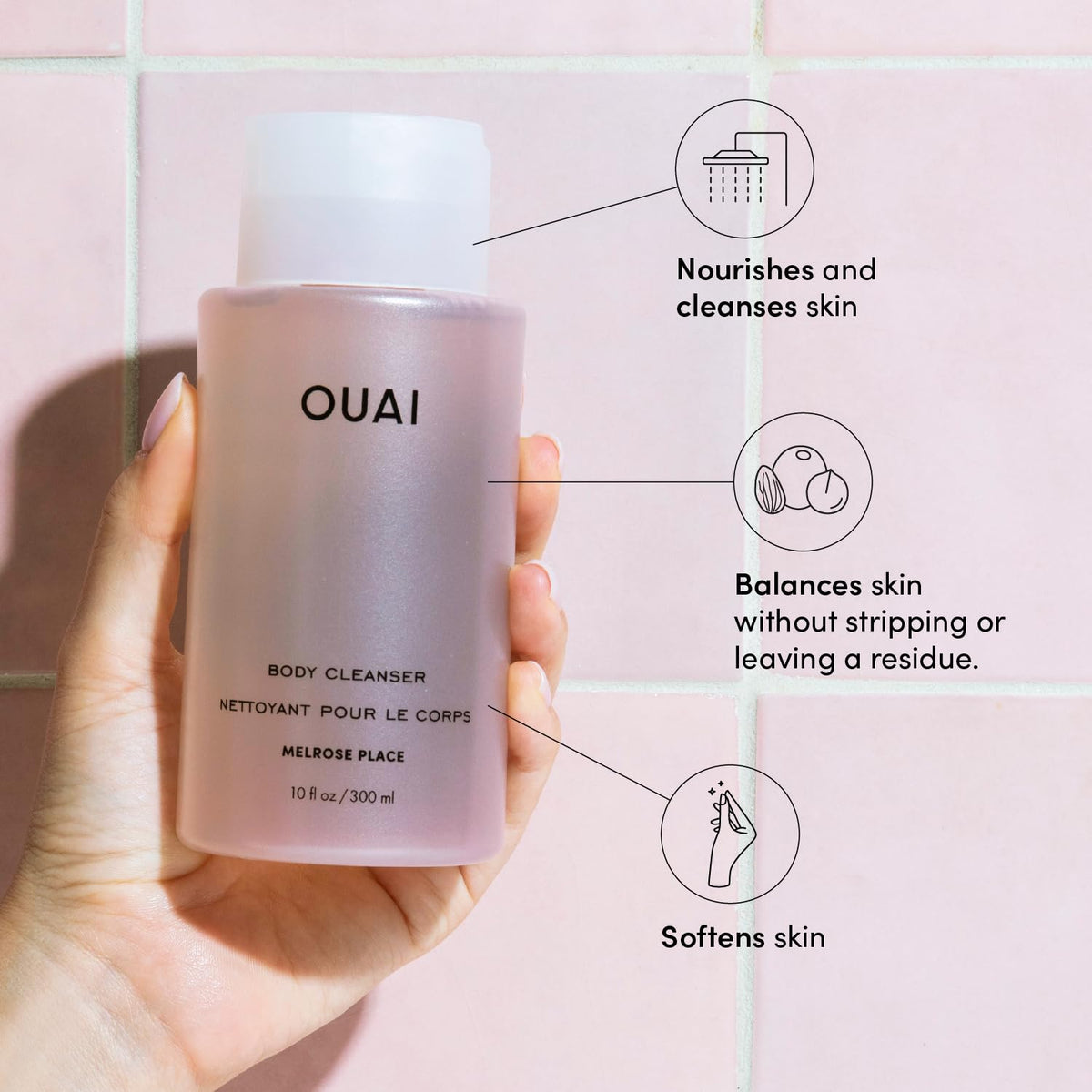 OUAI label closeup and pump detail highlighting brand quality and user-friendly dispenser