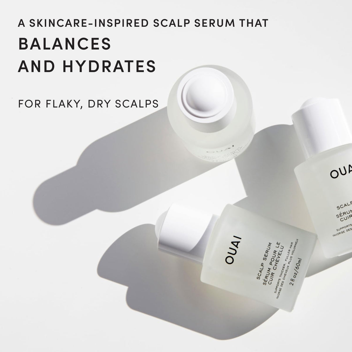 OUAI dropper dispensing clear serum illustrating easy targeted application benefit