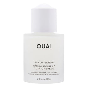 OUAI bottle front view showing sleek label and 2 fl oz size benefit