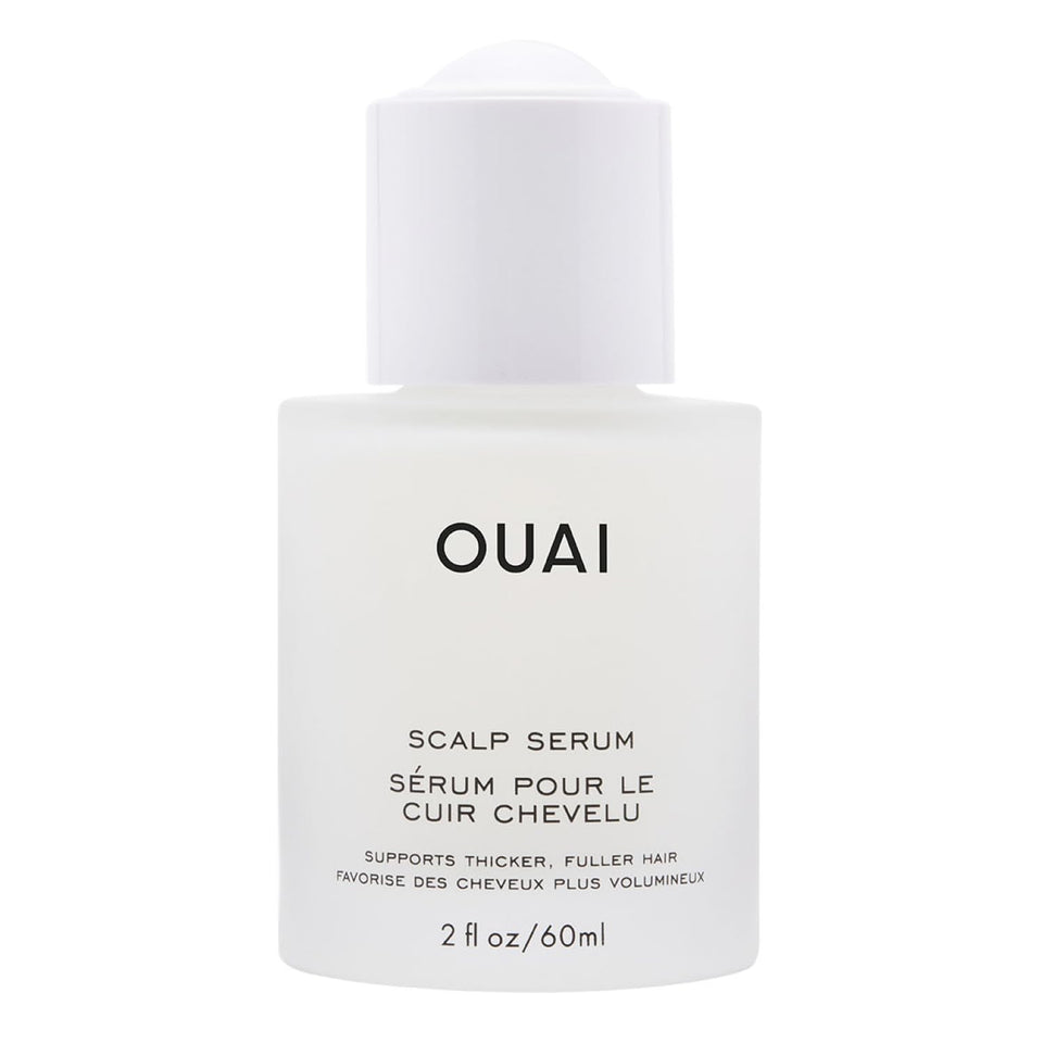 OUAI bottle front view showing sleek label and 2 fl oz size benefit