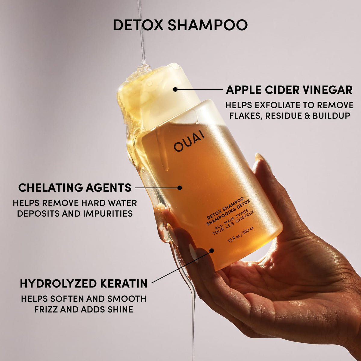 OUAI kit held in hand for scale showing travel-friendly sizes and portability benefits