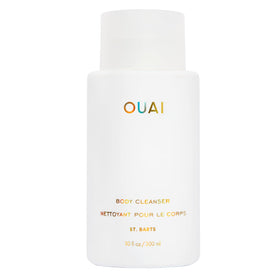 OUAI bottle front view showing St. Barts label and sleek design, highlights luxury