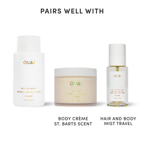OUAI bottle in shower scene, conveys spa-like experience and mood boost