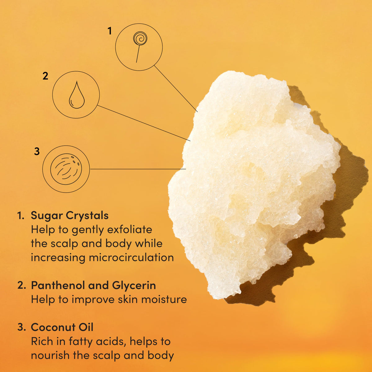 OUAI St. Barts scrub in hand demonstrating scoopable texture and skin-softening benefit