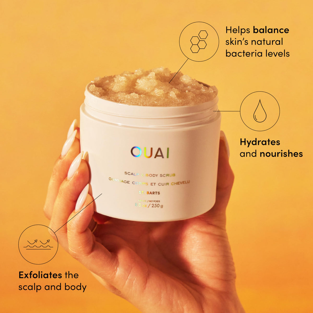 OUAI St. Barts scrub texture close-up showing sugar crystals and creamy coconut oil balance