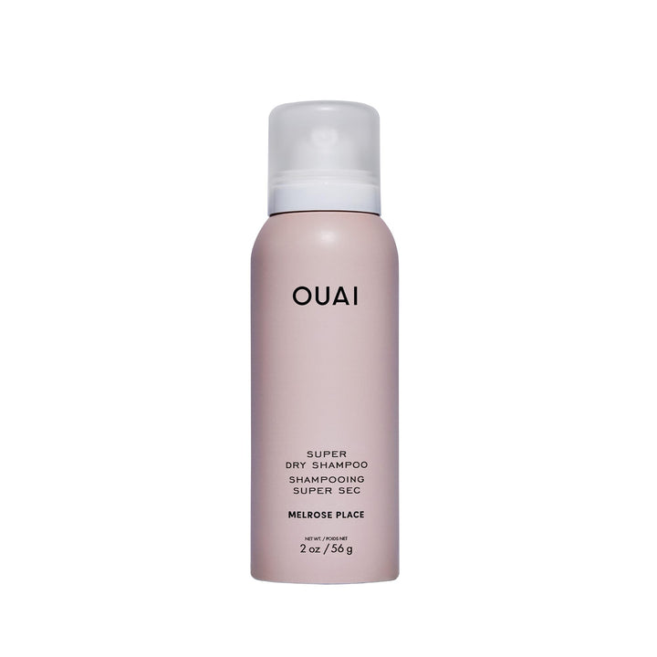 OUAI front packaging showing compact 2 oz can and branding for travel convenience