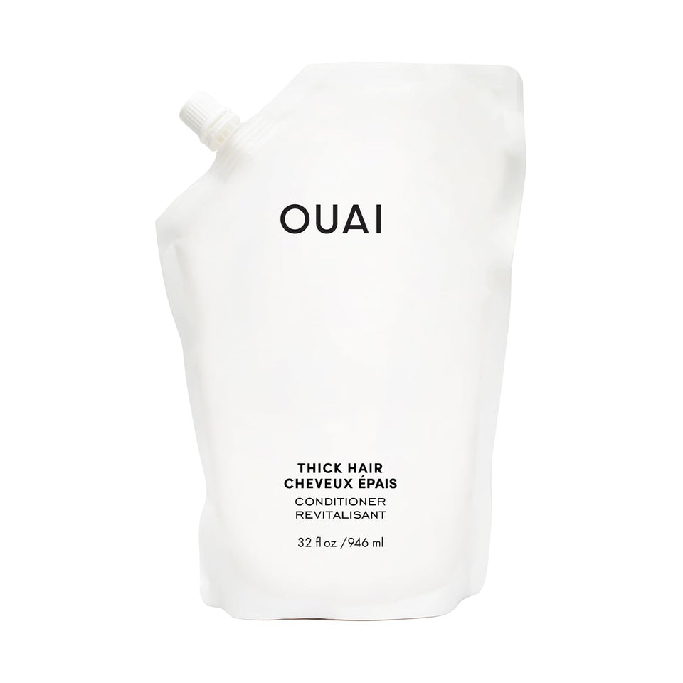 OUAI refill front label showing product name and size, clear benefits