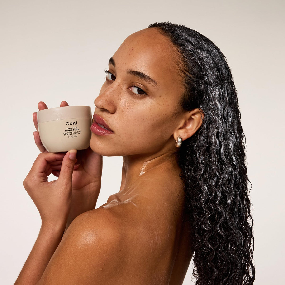 OUAI before and after hair ends comparison showing smoother, stronger looking strands