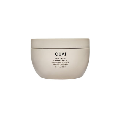 OUAI front tube of thick hair mask showing product name and size, highlights repair