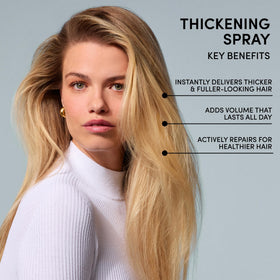 OUAI mist settling on hair strands showing lightweight texture and lift benefit
