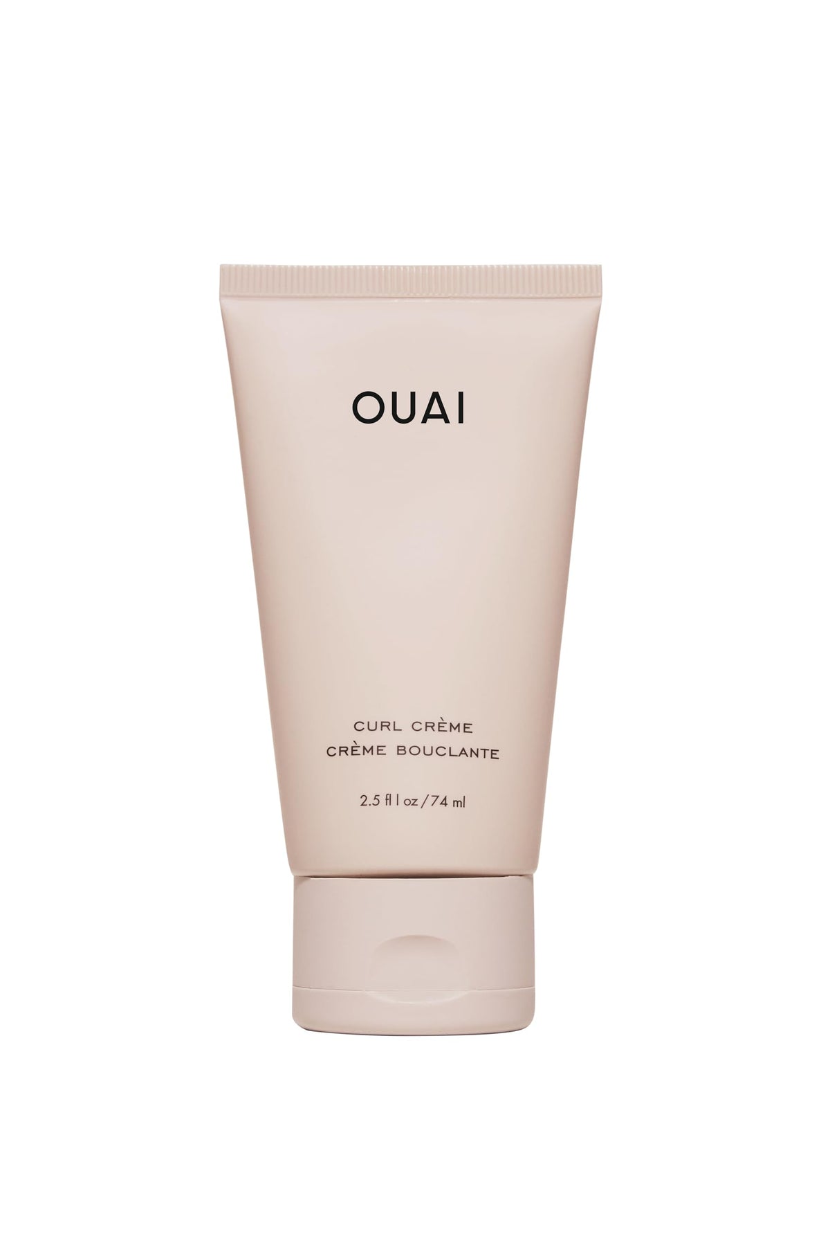 OUAI travel curl cream front tube showing compact travel-friendly packaging and portability