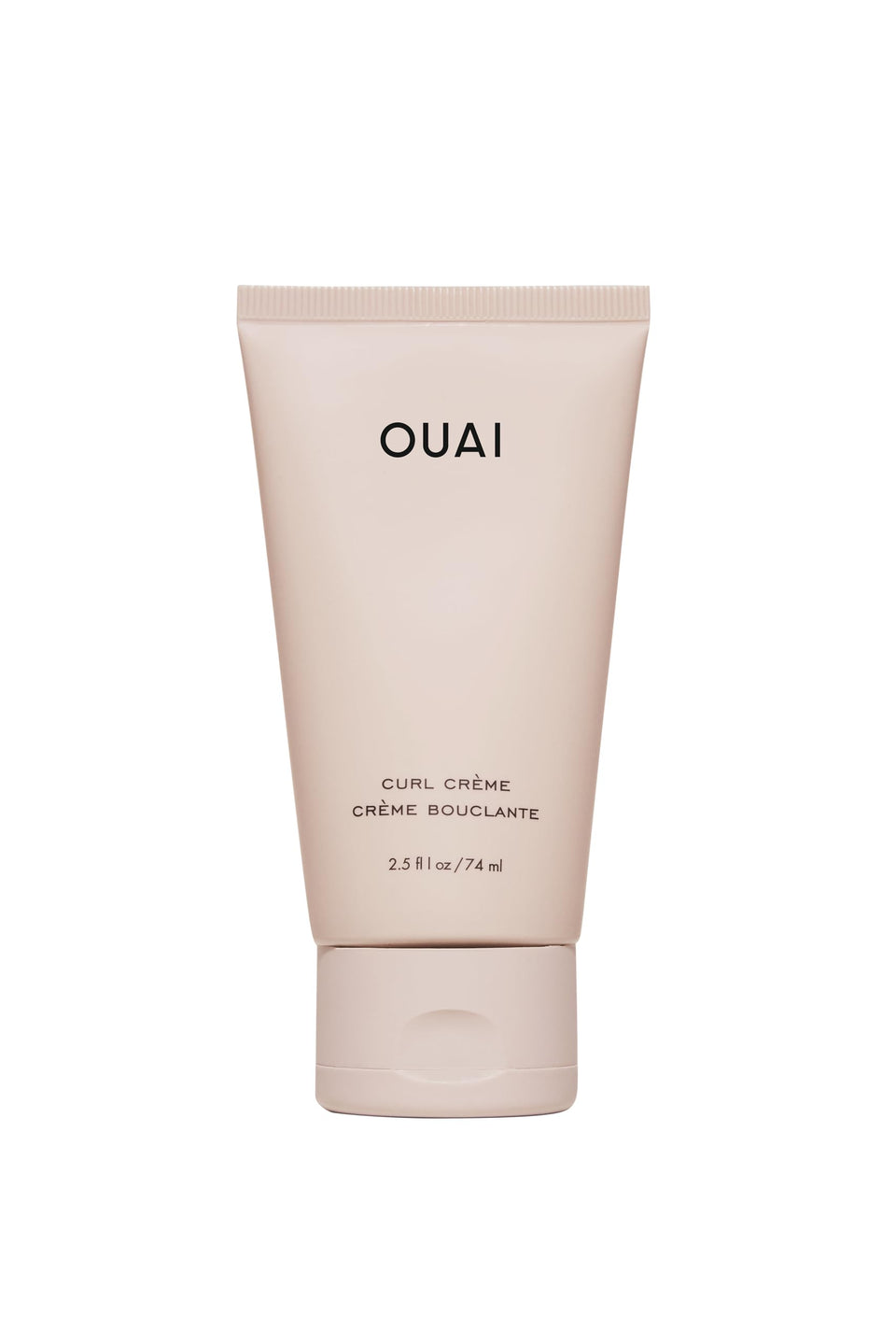 OUAI travel curl cream front tube showing compact travel-friendly packaging and portability
