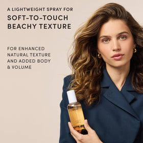 OUAI back label close-up showing ingredients and travel-friendly directions