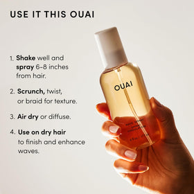 OUAI beside a credit card to show travel-size 3 fl oz portability