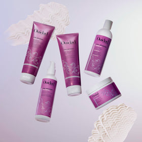 Ouidad applied in shower on coily hair to hydrate and strengthen