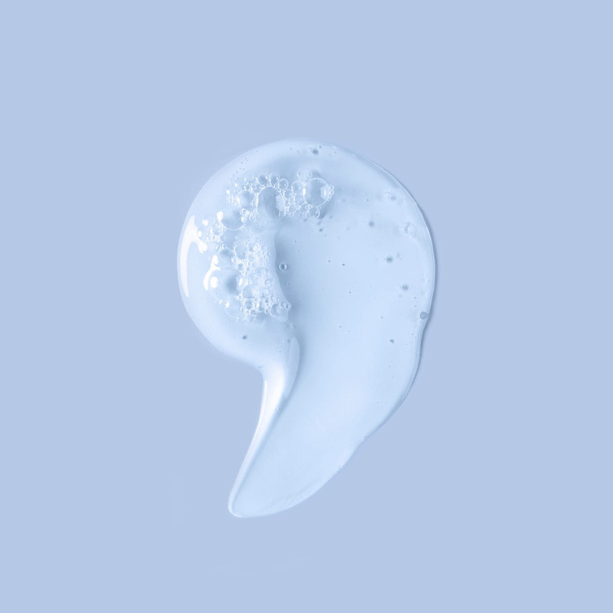 Ouidad foam on curly hair demonstrating gentle cleansing and improved definition