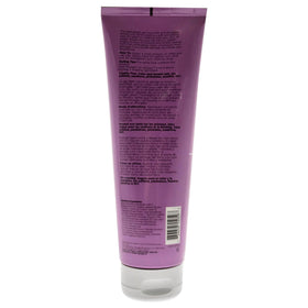 ouidad cream texture in hand demonstrating smooth application and hydration