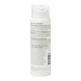 Ouidad cream texture close-up demonstrating rich hydrating formula for soft curls