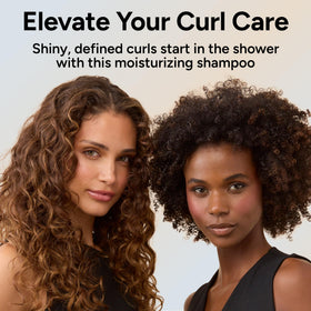 Ouidad being applied to wet hair in shower showing gentle cleansing action