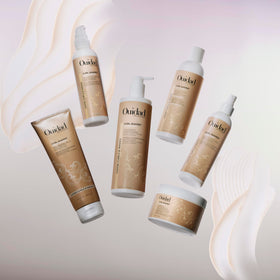 Ouidad Curl Shaper in use on curly hair demonstrating refreshed bounce and definition