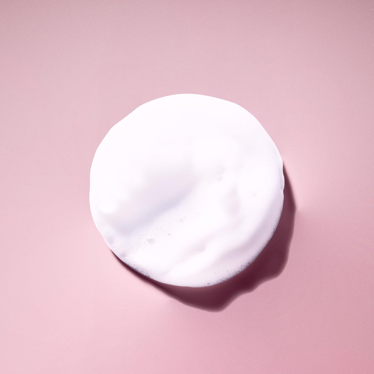 Ingredient label on Ouidad foam showing aloe and sweet almond oil