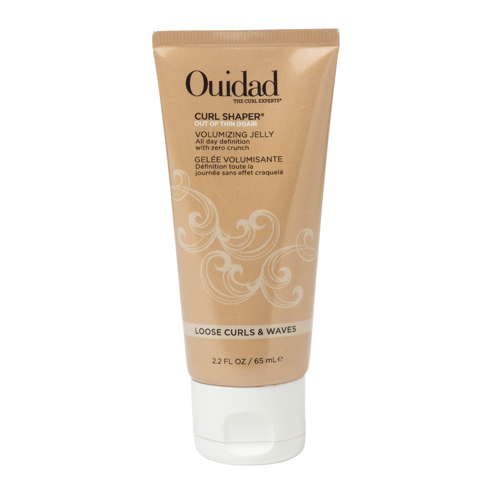 Ouidad front tube showing product name and travel-friendly 2.2 oz size for easy styling