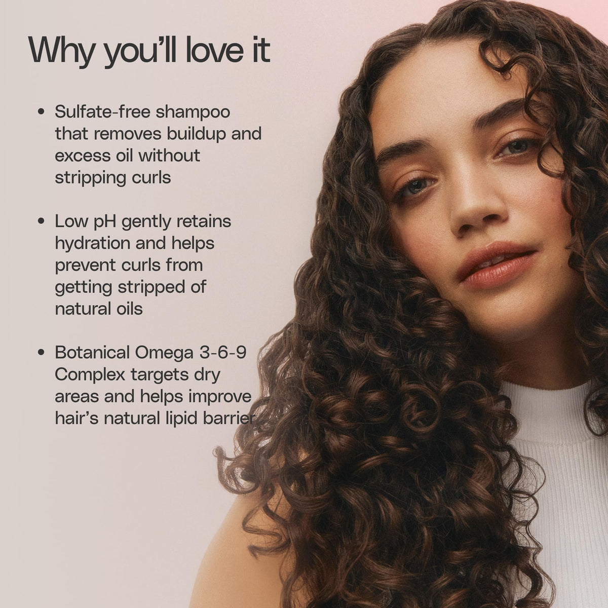 Ouidad shampoo being applied to wet hair for gentle cleansing