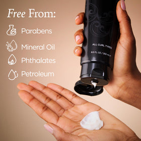 Ouidad label closeup highlighting keratin, ceramides and FiberHance