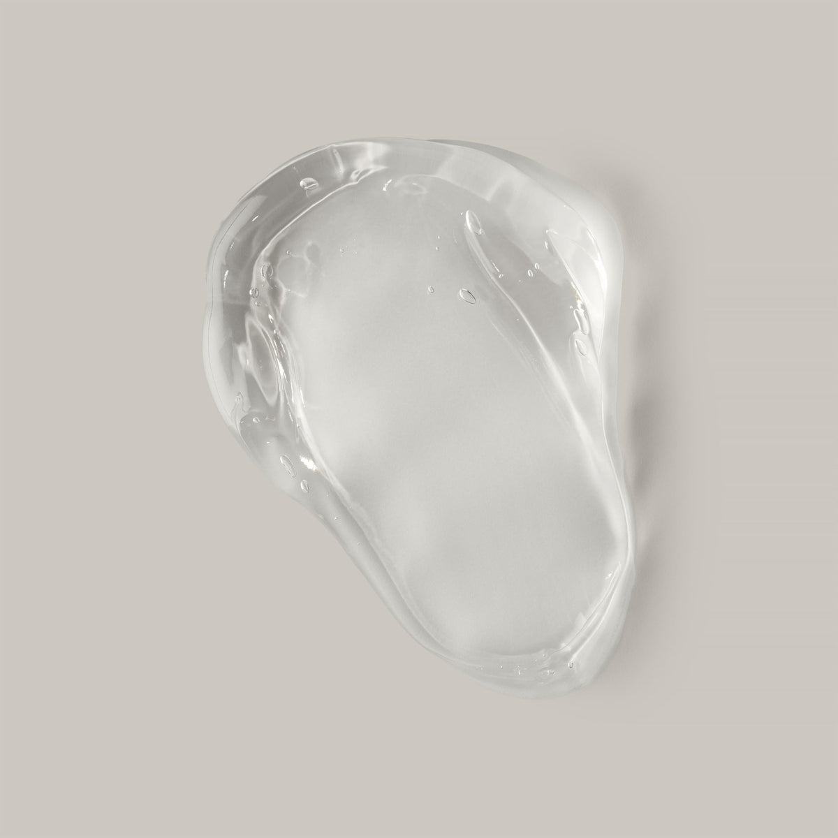 Ouidad clear gel texture close-up highlighting hydration and non-flake finish
