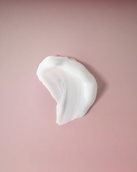 Ouidad texture closeup displaying lightweight gel cream for touchable curls