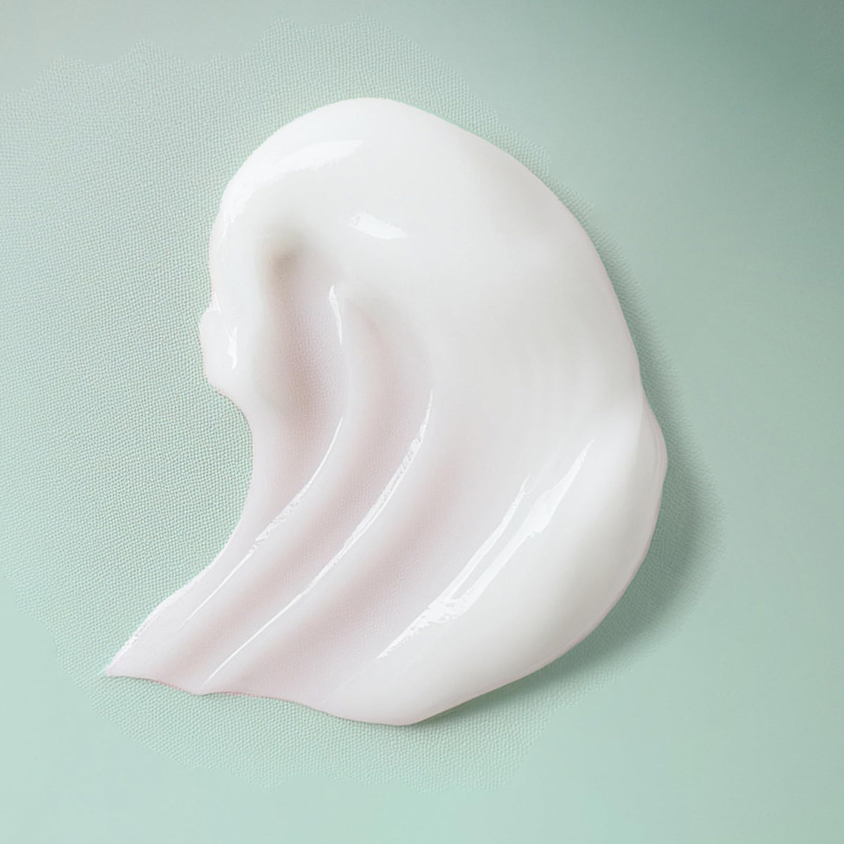 Ouidad VitalCurl+ applied to wet curls, delivering defined clumps and shine