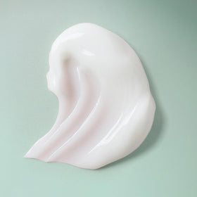 Ouidad VitalCurl+ applied to wet curls, delivering defined clumps and shine