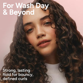 Ouidad gel on a bathroom shelf in lifestyle setting suggesting daily routine use