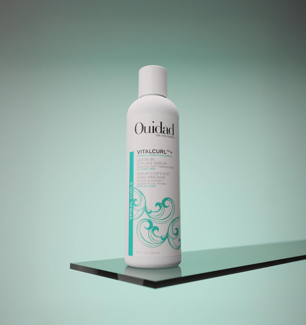 Ouidad VitalCurl pump dispensing a drop of serum for controlled application benefit
