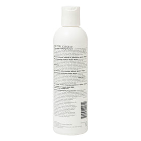 Ouidad Water Works lather on curly hair demonstrating gentle effective cleanse