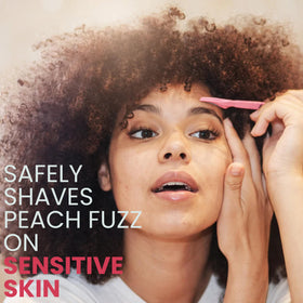 Ouiloe shave oil bottle close-up highlighting non-comedogenic, unscented formula