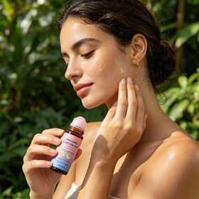 OUKPANE rolling oil onto eyebrow for neat, targeted brow conditioning benefit
