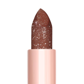 Oulac in evening clutch showing glamorous shimmer and ready-for-night benefit