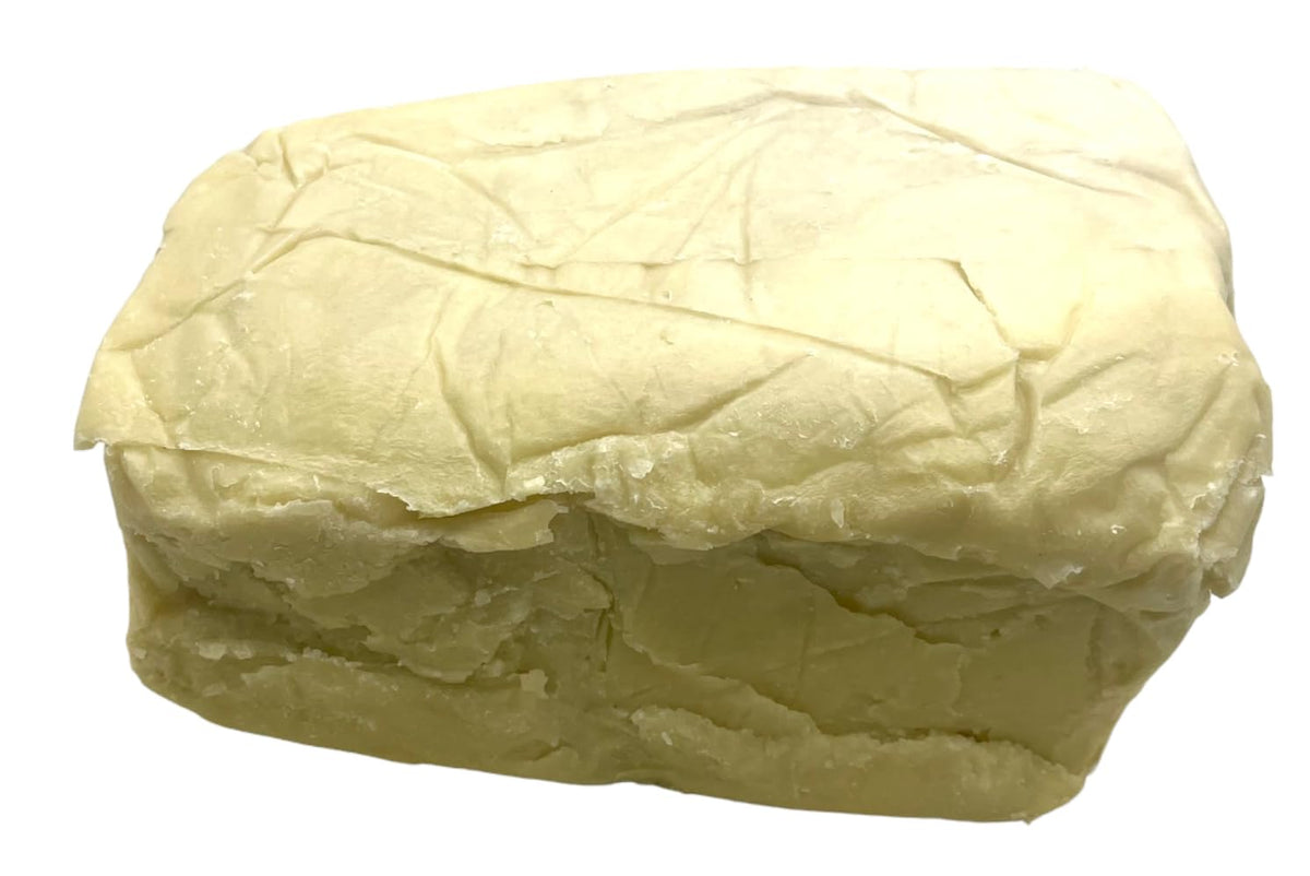 Our Earth's Secrets shea butter close-up texture highlighting creamy nutrient-rich feel