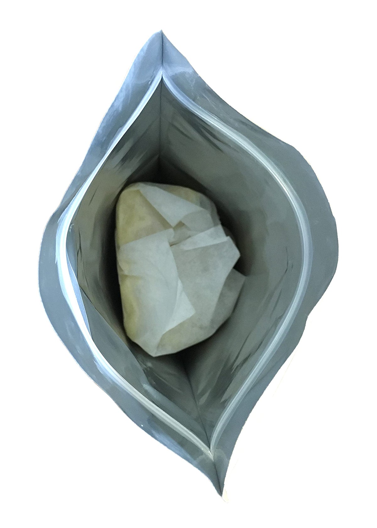 Our Earth's Secrets shea butter melting in bowl demonstrating easy blending for formulations