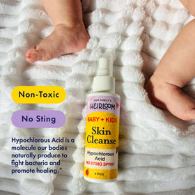 Our Family's Heirloom mist being applied to baby skin to soothe and calm redness