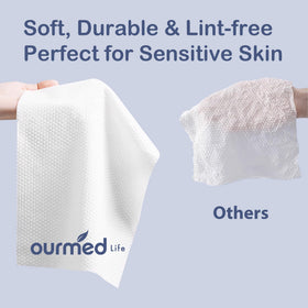 ourmed life towel in hands demonstrating quick expand and gentle texture