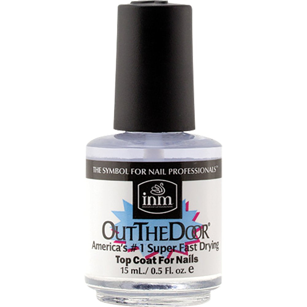 Out the Door brush applying glossy topcoat on nail swatch to demonstrate high-gloss protection